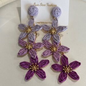 Purple dangling earnings
